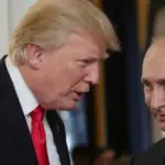 Путіна на Алясці зустрічають червоною доріжкою та банером “Прагнення до миру”
